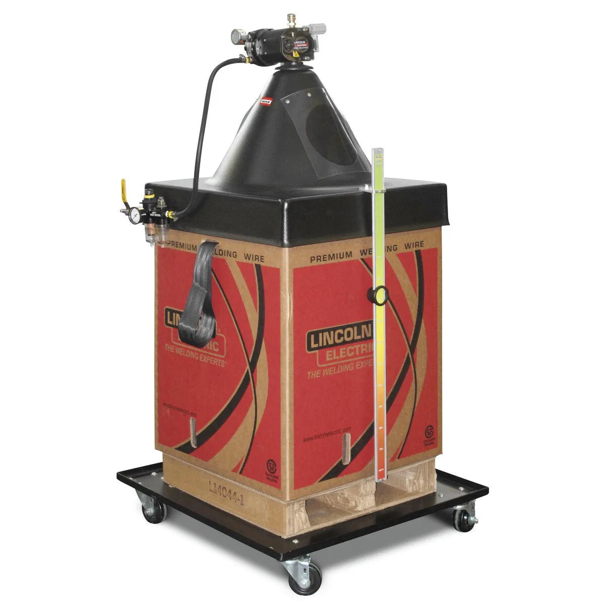 A large Lincoln Accu-Pak cardboard box sits on a black wheeled cart, topped with a wire feeder and gas regulator for welding wire dispensing, showcasing the efficiency of the Accu-Pak Box Payoff Kit.