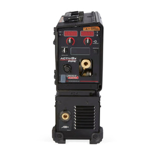 A front view of the Lincoln Activ8X Pipe (Tweco) K4717-1 welder shows its black metal body with digital displays, control knobs, connection ports, and warning labels. The brand and model appear clearly near the center. Designed for pipe welding.