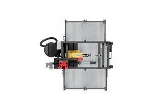 Top view of Lincoln ClassMate® M Robotic Trainer AD2446-20 with metal frame, wiring, and robotic arm for welding training.