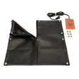 The Lincoln Cold Weather Kit for Cross Country 300 (Kubota) Engine Driven Welder K4213-1 includes a black rectangular heating pad with grommets, power cord, brown control tag, and lining. Six metal nuts are beside it on a white surface.