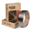 A 50 lb coil of Lincoln ED010954 Lincolnweld LAC-B2 Submerged Arc SAW Welding Wire (3/32 in) stands upright before two stacked brown Lincoln Electric boxes with red and black branding on a crisp white background.
