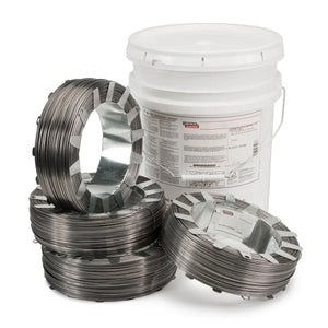 A white plastic bucket sits behind five dark metal coils of Lincoln ED011277 Lincore 55 Flux-Cored FCAW-S Welding Wire, 5/64 in, 4 x 14 lb coils. The highly wear resistant wire is arranged closely on a white background.
