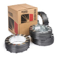 Four coils of Innershield NR-311 flux-cored wire are stacked beside and in front of a cardboard Lincoln Electric box, with black labels and red and black design elements visible on the packaging.