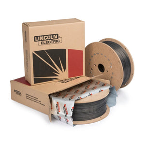 Two large spools of UltraCore 712C Flux-Cored Welding Wire, one partially wrapped in branded packaging, are displayed next to two brown Lincoln Electric cardboard boxes.