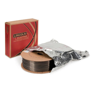 A spool of UltraCore 712C flux-cored welding wire partially wrapped in silver packaging, with a red and brown Lincoln Electric box labeled The Welding Experts in the background.