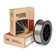 Lincoln ED035665 SHS 8000W Welding Wire 25 lb spool in front of Lincoln Electric boxes, ideal for arc spray and boiler tube welding.