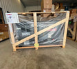 Lincoln Cross Country 300 Kubota engine drive welder U4166-1, crated and wrapped, on warehouse floor at WeldingMart. Pipeline-ready.
