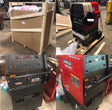 Lincoln Precision TIG 275 Ready-Pak Welder U2618-1—multiple angles, crate, red finish, control panel in workshop at WeldingMart.