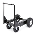 The Lincoln Factory Undercarriage K3589-1 is a black metal portable cart with a flat frame, two large rear rubber wheels, two front caster wheels, and an upright handlebar. Shown empty against a white background; perfect for factory undercarriage tasks.