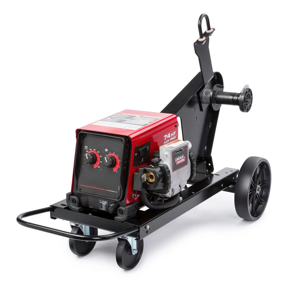 The Lincoln Flex Feed 74 HT Simple U/I, Hvy. Dty. Reel, Gouge Kit K3883-13 is a portable welding machine with a red metal box, two control knobs, four wheels, an angled handle, spool holder, and a semiautomatic wire feeder for smooth wire delivery.