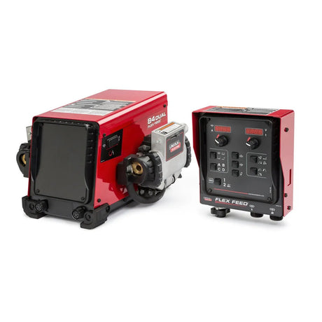 Two red Lincoln Electric wire feeders are shown. The left device is horizontal with visible large-diameter wire rollers; the right is a Lincoln Flex Feed 84 Dual Boom Feeder One-Pak K5002-11 with labeled controls for wire feed speed adjustment.