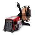 The Lincoln Flex Feed 84 Single Bench with Heavy Duty Wire Reel Stand K5000-2, in red and black, features digital displays, control knobs, and a sturdy reel stand with copper wire spool for precise feed speed, shown on a white background.