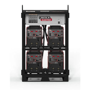 The Lincoln Flextec 350X Construction (Tweco) 4-Pack Rack K3402-3 is a black, rack-mounted unit holding four welders in two rows, featuring a metal control panel with the Lincoln Electric logo, switches, and breakers for multiple arc management.