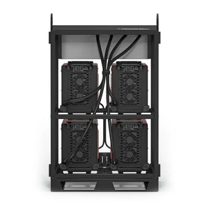 The Lincoln Flextec 350X PowerConnect 4-Pack Rack K4726-1 holds four compact, black units with visible cooling fans and red accents—two per shelf—with organized thick black cables neatly connected at the back.