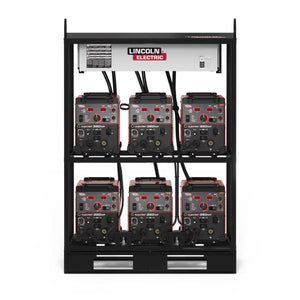 The Lincoln Flextec 350XP (Tweco) 6-Pack Rack K4281-2 holds six red and black multi-process welders in two rows of three, each with cables attached, and features the Lincoln Electric logo on a white top panel.