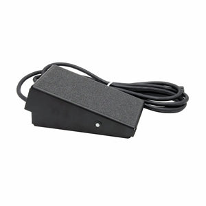 The Lincoln Foot Pedal K4361-1 features a black, textured non-slip surface and a thick attached cable for precise amperage control. Its sturdy, sloped rectangular design is ideal for Lincoln LE31MP setups. Cable is coiled neatly beside the pedal.