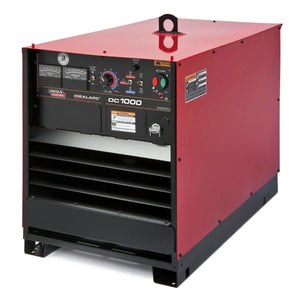 The Lincoln Idealarc DC-1000 Subarc Welder - K1386-4 features a red and black metal body, front control panel with dials and gauges, vented lower section for airflow, and a top lifting eye for easy transport.