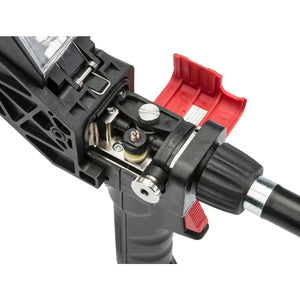 Close-up of a cable stripping tool with coaxial cable inserted, used as an accessory for the Lincoln Magnum PRO 250LX Spool Gun 25 ft K3570-2. Features exposed stripping blades, adjustment screws, and a red clamp for stable operation.