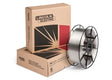 A spool of Techalloy 55 MIG welding wire sits beside two stacked cardboard boxes labeled Lincoln Electric, featuring a graphic design with black and red accents—ideal for cast iron welding projects.