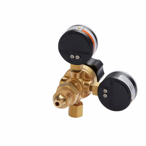 The Lincoln MIG Conversion Kit K610-2 is shown angled on a white background. It features a brass gas regulator with two black pressure gauges, an adjustment knob, and threaded connectors for easy attachment to cylinders and equipment.