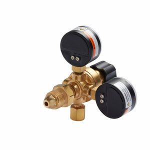 The Lincoln MIG Conversion Kit K610-2 is ideal for MIG welding, featuring a brass gas regulator with two clear black pressure gauges, metallic fasteners, a central adjustment knob, threaded inlet, and outlet port against a white background.