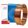 A large spool of Lincoln OES225V-32-25VCI OE-CROMO S225V copper welding wire stands upright before a blue and white Oerlikon box. The neatly coiled wire suits Cr-Mo-V base materials; the box features multilingual text and a wire illustration.