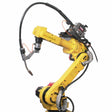 A yellow industrial robotic arm with multiple joints and flexible cables is shown with a Lincoln POWER FEED 10R WIRE DRIVE SYSTEM K1780-3 and welding tool attached, highlighting its use in automated welding for manufacturing or assembly. The background is plain white.