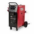 The Lincoln Power Wave 300C Advanced - K4488-1 is a red and black industrial welding machine with a digital control panel, wheels, top and side handles for easy transport, and multiple front dials, slots, and connectors.