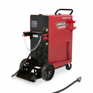 A Lincoln Power Wave 300C Advanced (K4488-1) all-process welder in red features a black handle, vented sides, control panel, attached cables with protective chain in front, and a main cable extending toward the foreground.