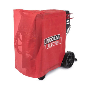 A red Lincoln Power Wave 300C and Power MIG 260/360 MP Canvas Cover (K3675-1) with a bold white and black Lincoln Electric logo snugly protects the welder, partially revealing wheels, cables, and the machines 260 marking.