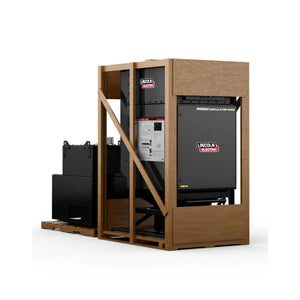 A Lincoln Prism Circulator 4000, 480V Input, Nano Filter K5140-1 for welding fume and air filtration is enclosed in a wooden crate with diagonal beams; part of the equipment is visible on its wooden base.