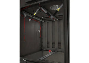 The image displays the interior of a Lincoln Prism® Compact (5 HP 2400 CFM) AD2455-3 fume extraction unit, featuring metal bars with yellow warning labels, red wiring, and a grated lower platform. The enclosure is clean and empty.