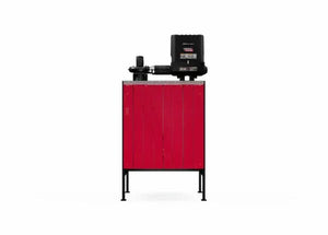 The Lincoln Single Weld Booth Fume Extraction One-Pak 5x5 ft. (K5563-1) features a red rectangular body with vertical front panel lines, black piping, and a top-mounted black control unit. It stands on four legs against a plain white background.