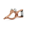 The Lincoln T-Series 300 Amp Brass Ground/Work Clamp K5151-1 features a brass body, a coiled silver spring near the jaw, a rounded handle, bolt fastener, and cylindrical connector. The clamp is shown angled to highlight its jaw and spring mechanism on a white background.