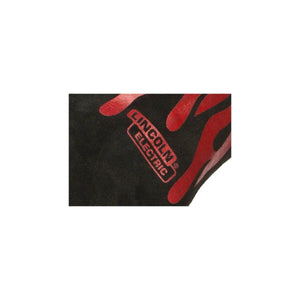 Close-up of black, heat-resistant fabric with red flame designs and “LINCOLN ELECTRIC” logo, featured on Lincoln Traditional Stick/MIG Welding Gloves K2979-ALL, reminiscent of premium split cowhide welding glove styling.