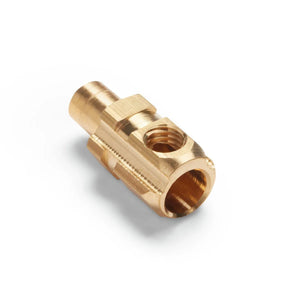 A brass machined Lincoln Twist Mate Plug welding cable connector with multiple threaded holes and a cylindrical shape, placed on a white background.