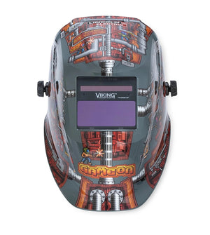 The Lincoln VIKING 1740 Game On Welding Helmet (K5562-3) features a retro video game design with pixel characters and pipes, a 4C auto-darkening lens, and bold “GAMEON” text in pixel font near the chin.