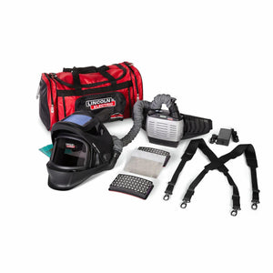 Lincoln VIKING 3250D FGS PAPR welding helmet kit with carry bag, PAPR unit, filters, hose, and harness on white background.