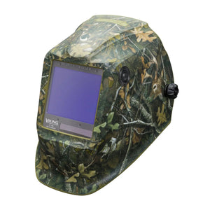 The Lincoln VIKING 3350 White Tail Camo Welding Helmet (K4412-4) features a leaf-and-branch camo design, a large rectangular lens with 4C Lens Technology, clear branding below the lens, and side knobs for fitting and auto-darkening control.