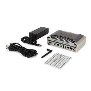 Lincoln Voyage Arc LAN Controller K5392-1 mini PC for welding systems, with power adapter, antenna, power cord, and labels.