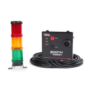 The Lincoln Weld Booth Assist K5319-1 features a black control box with buttons, indicator lights, and a coiled cable, positioned next to a vertical signal tower with red, yellow, and green lights—ideal for welding booth monitoring.