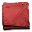 A red Lincoln Welding Blanket - 6 ft x 6 ft (K3253-1), rated for 550°C, lies neatly folded with reinforced edges, visible stitching, four metal grommets, and ANSI/FM 4950 certification on a white background.