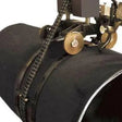 A welding machine with wheels and a chain is attached to a large black pipe, preparing for automated welding or cutting along the pipes seam.